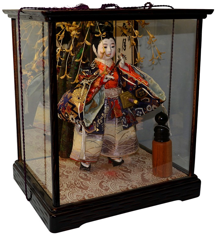 japanese antique doll in a glass box