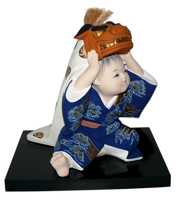a child with big mask of Lion, japanese hakata clay doll