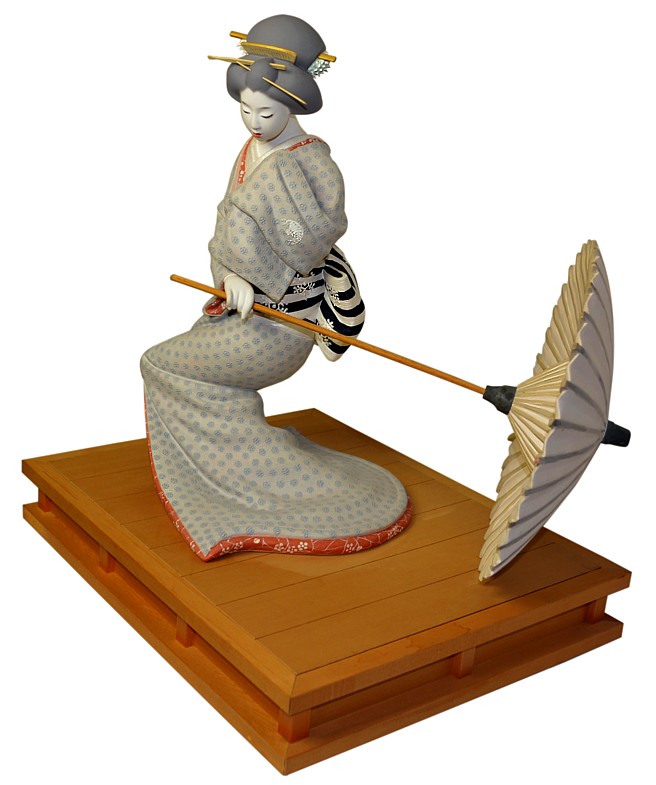 Japanese traditional art: dancing geisha Hakata clay doll