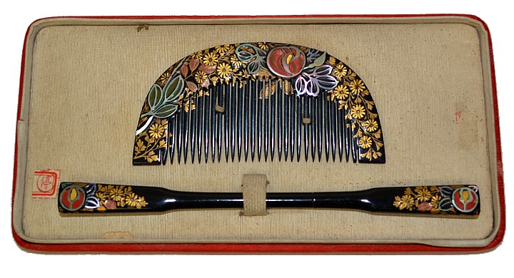 antique japanese wooden comb with golden flowers and persimmon motif